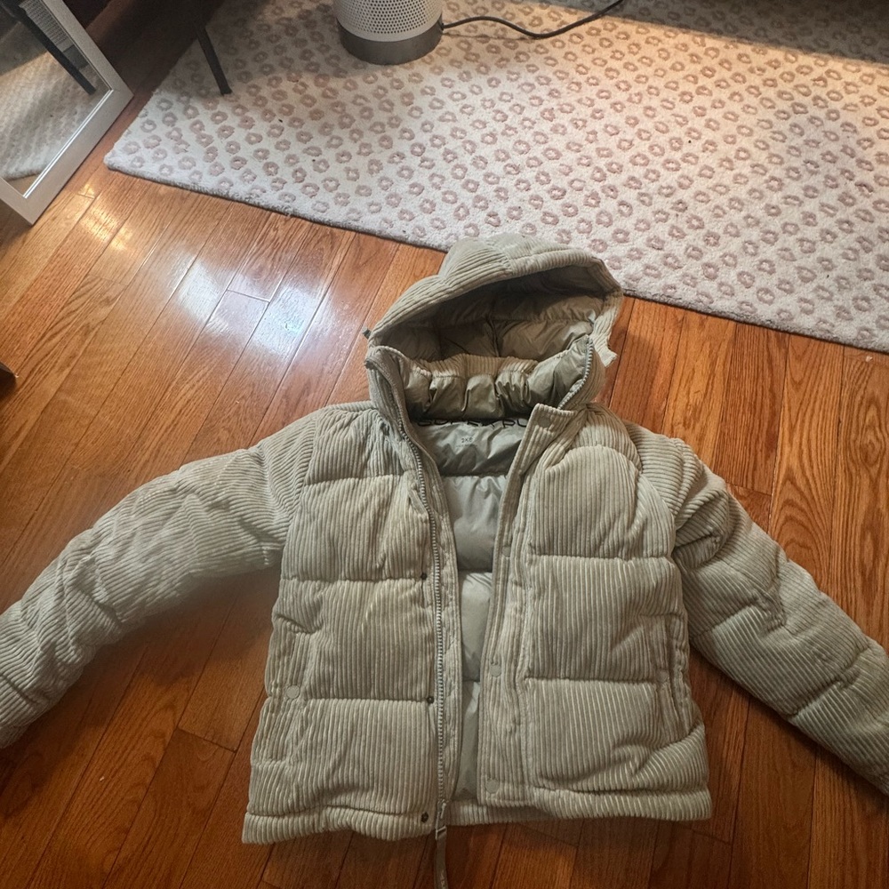 The Super Puff Jacket
size 2xm 
have it for a year.